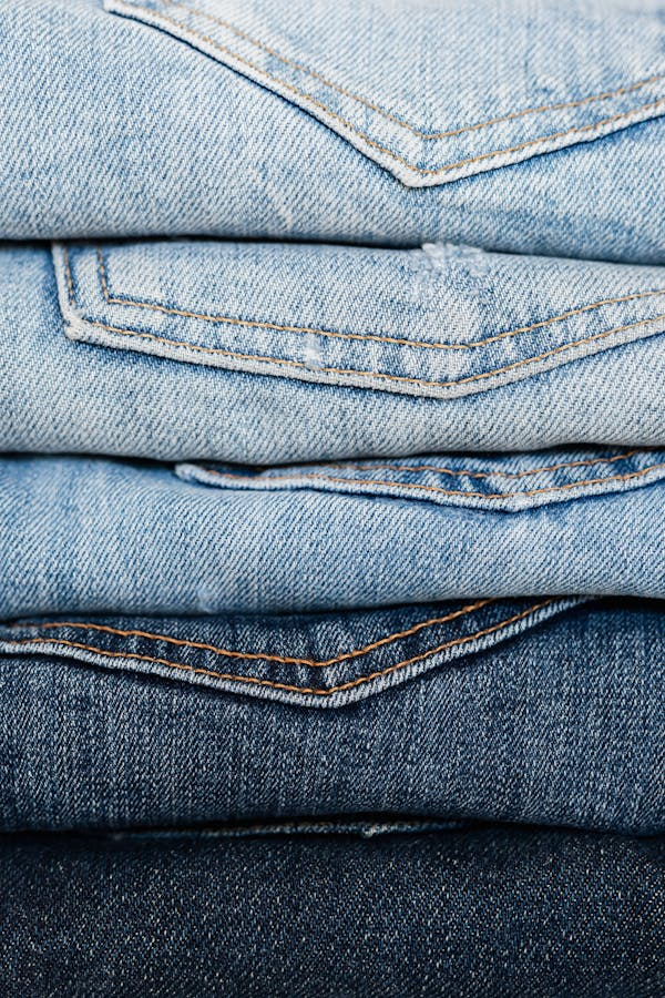 Jeans folded in a stack. 